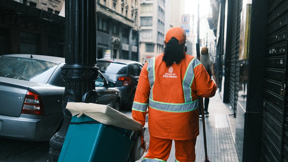 Dedicated cleaning professional preparing equipment for a home service